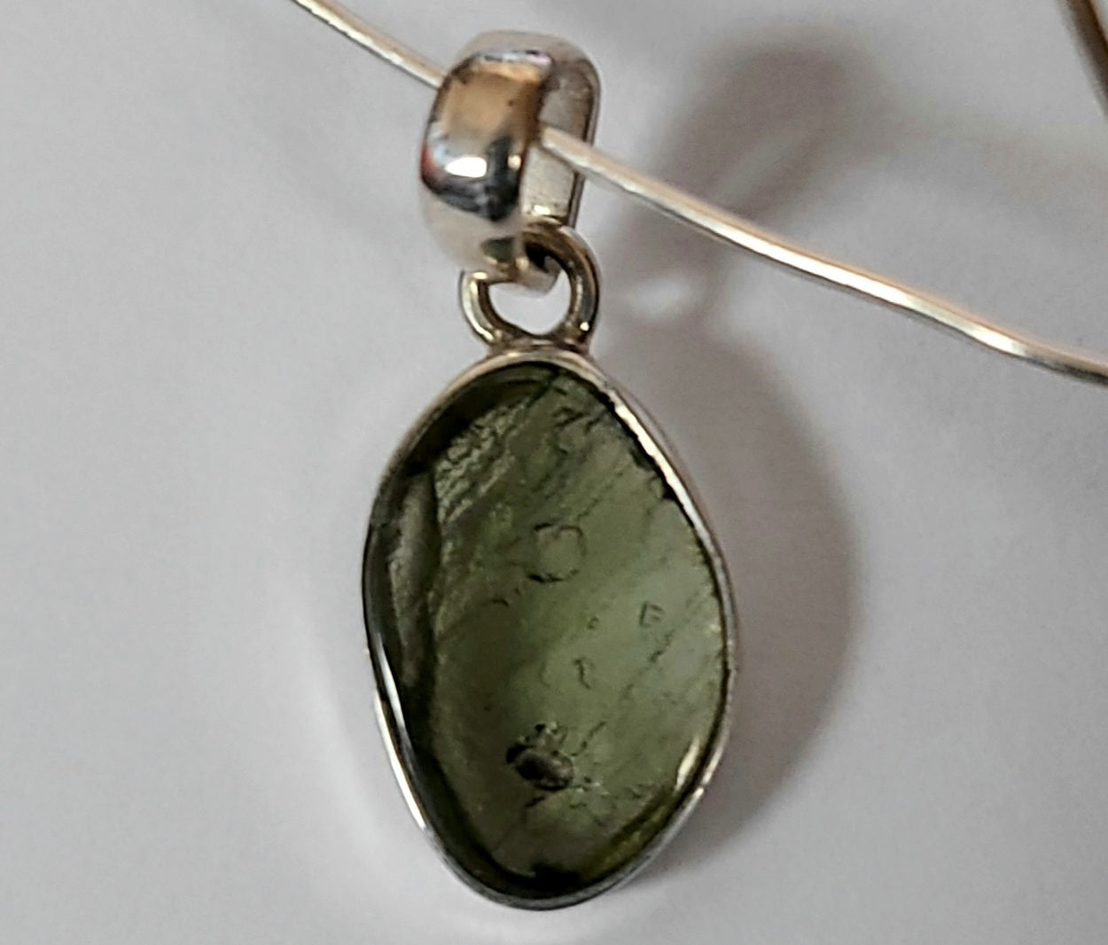 Oval Polished Moldavite Pendant in Sterling Silver