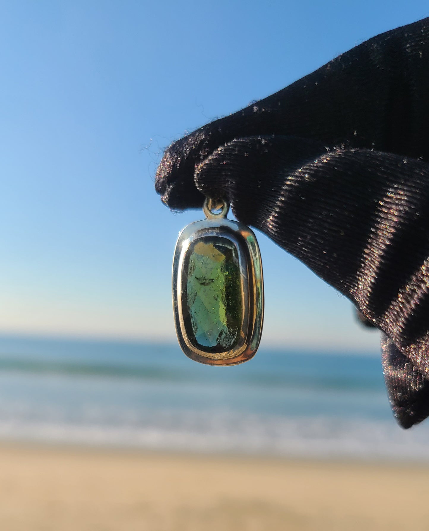 11+ Carat Faceted Moldavite Pendant in Sterling Silver