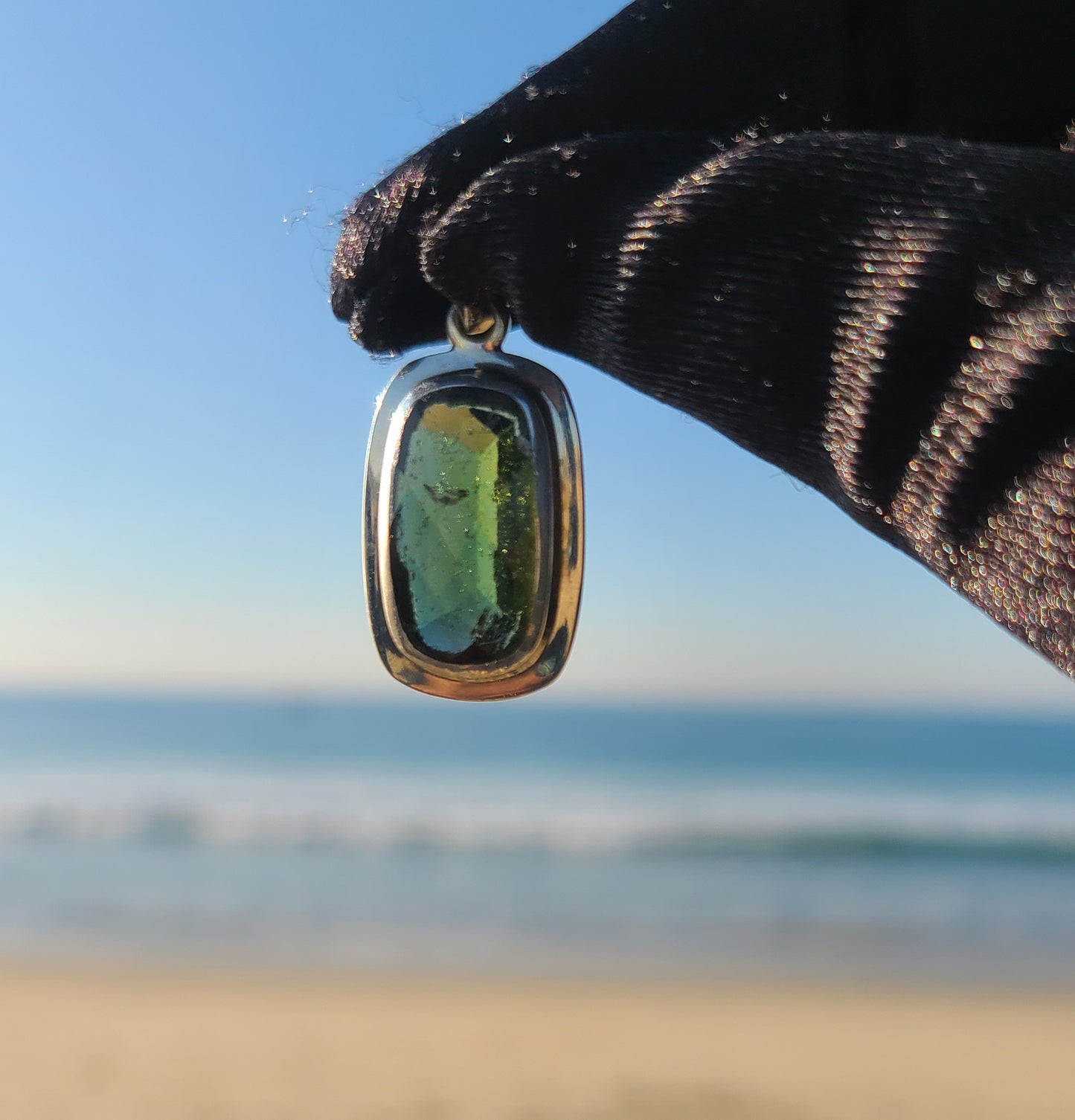 11+ Carat Faceted Moldavite Pendant in Sterling Silver